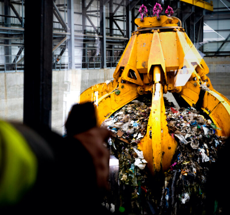 Overhead residual waste cranes moving non-recyclable waste